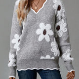 Belinha | Elegantní svetr s V výstřihem a květinovým motivem