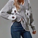 Belinha | Elegantní svetr s V výstřihem a květinovým motivem