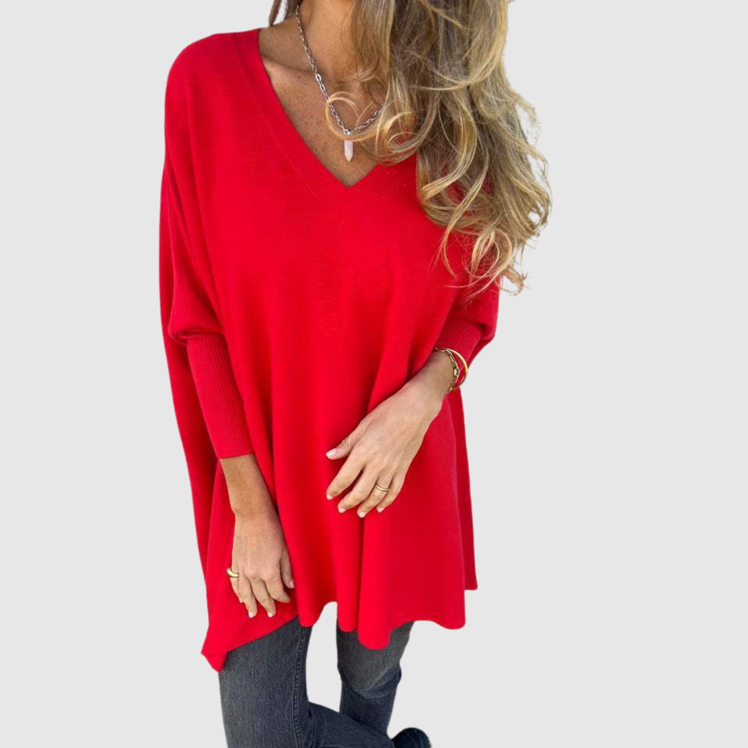 "Nora – Elegantní svetr s V-výstřihem" can be rewritten as "Nora – Stylový svetr s V-výstřihem".