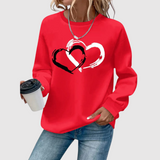 "Nina – Mikina s potiskem srdcí" can be rewritten as "Nina – Mikina s motivem srdcí".