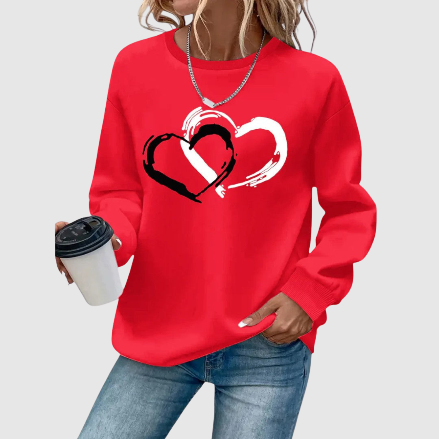 "Nina – Mikina s potiskem srdcí" can be rewritten as "Nina – Mikina s motivem srdcí".