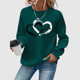 "Nina – Mikina s potiskem srdcí" can be rewritten as "Nina – Mikina s motivem srdcí".