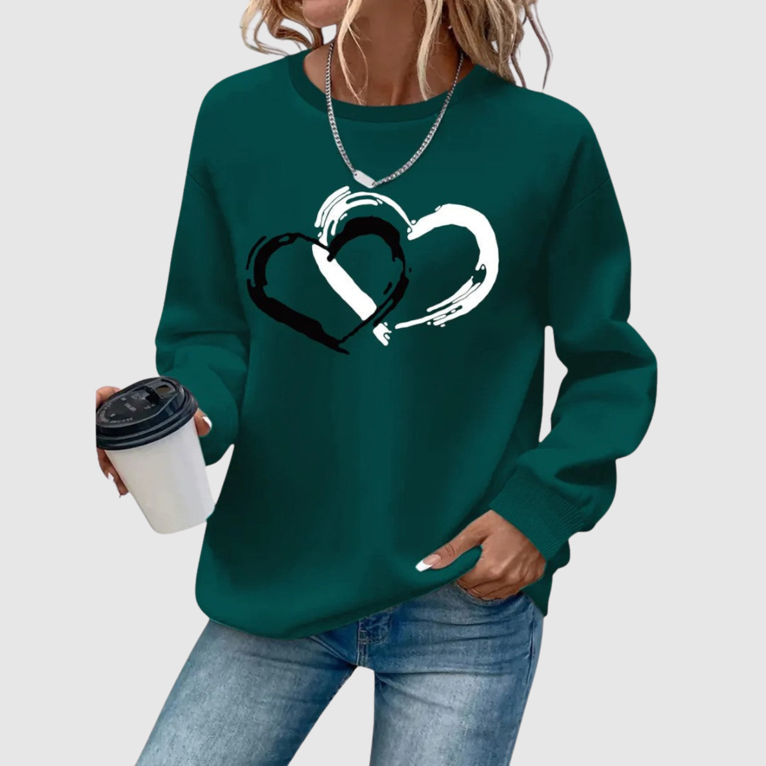 "Nina – Mikina s potiskem srdcí" can be rewritten as "Nina – Mikina s motivem srdcí".