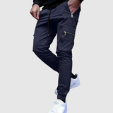 "Leo – Pánské joggingové kalhoty s kapsami na zip" can be rewritten as "Leo – Pánské zipové joggingové kalhoty s kapsami".