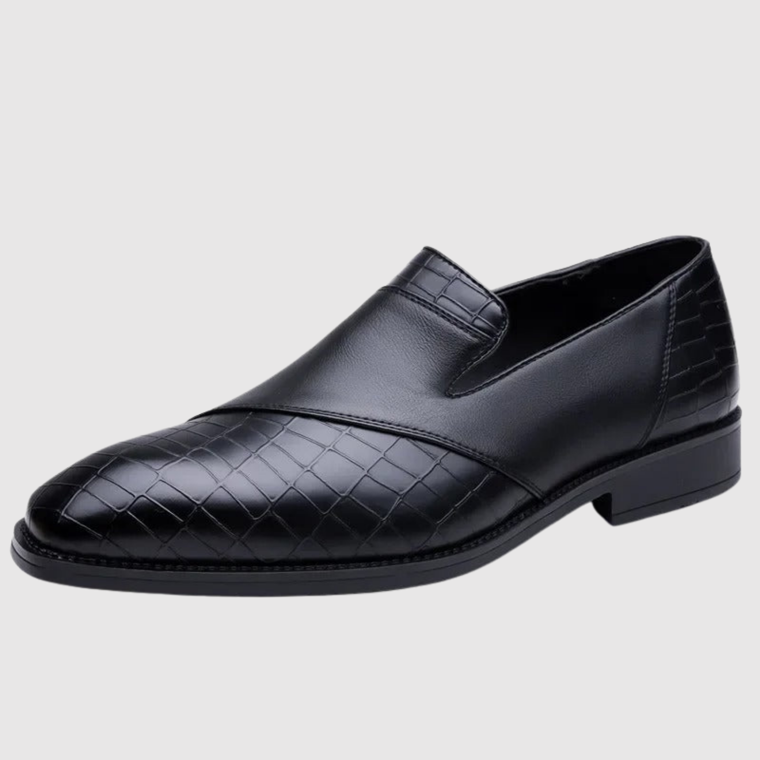 "Viktor – Pánské slip-on boty z pletené kůže" can be rewritten as "Viktor – Pánské slip-on boty z pletené kůže pro pohodlný styl".