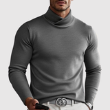 Adrian – Klasický pletený svetr s polo límcem" can be rewritten as:

"Adrian – Tradiční pletený svetr s polo límcem