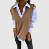 "Nora – Pletená vesta s V-výstřihem" can be rewritten as "Nora – Pletená vesta s V-krkem".