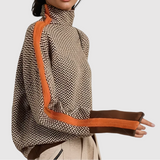 Nora – Moderní svetr s kontrastními rukávy" can be rewritten as: "Nora – Stylový svetr s kontrastními rukávy