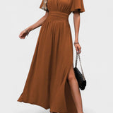 Eterna | Stylové černé maxi šaty s V-výstřihem, volnými rukávy a rozparkem