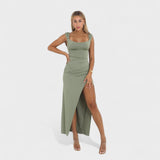 Sarella - Dlouhé šaty s odhalenými zády a mašlí" can be rewritten as:

"Sarella - Elegantní dlouhé šaty s odhalenými zády a stylovou mašlí