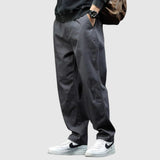 Leo - Inovativní Carbon-Flex kalhoty kombinující pohodlí a styl