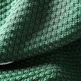 Nora – Volný svetr s vysokým límcem a strukturálním designem