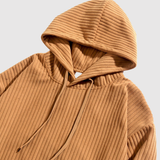 "Daniel – Mikina s širokými pruhy" can be rewritten as "Daniel – Mikina s širokými pruhy" (the title is already clear and descriptive, but if you want a variation, you could say: "Daniel – Mikina s výraznými pruhy").