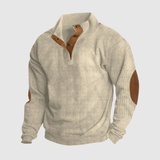 "Daniel - Pulovr s polo zipem a texturou" can be rewritten as "Daniel - Textured Polo Zip Sweater".