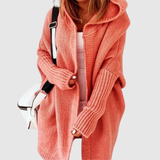 "Jelena – Dlouhý kardigan s kapucí" can be rewritten as "Jelena – Dlouhý kardigan s kapucí pro pohodlný styl".