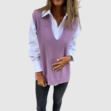 "Nora – Pletená vesta s V-výstřihem" can be rewritten as "Nora – Pletená vesta s V-krkem".