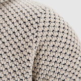 "Marek - Dlouhý pletený svetr s kapucí" can be rewritten as "Marek - Dlouhý pletený svetr s kapucí pro pohodlný styl".