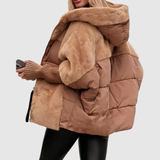 "Jelena – Krátká teddy bunda s objemem" can be rewritten as "Jelena – Krátká objemná teddy bunda".