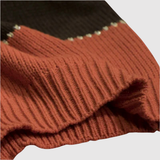 "Nora – Svetr s barevnými bloky" could be rewritten as "Nora – Svetr s barevnými akcenty".