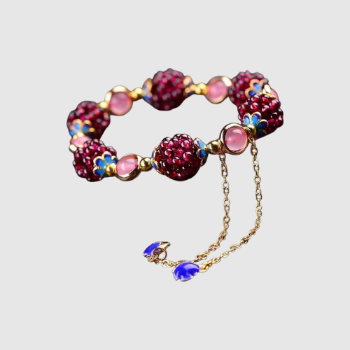 Liana – Umělecký náramek s červenými a modrými krystaly" can be rewritten as:

"Liana – Umělecký náramek s krystaly v červené a modré barvě