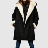 Jelena – Oversize zimní bunda s kontrastním límcem" can be rewritten as:

"Jelena – Velká zimní bunda s kontrastním límcem