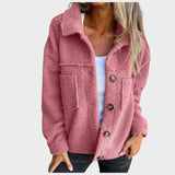 "Eva - měkká fleecová bunda s knoflíky" can be rewritten as "Eva - měkká fleecová bunda s dekorativními knoflíky".