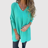 "Nora – Elegantní svetr s V-výstřihem" can be rewritten as "Nora – Stylový svetr s V-výstřihem".