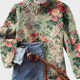 "Ângela - Umělecký pletený svetr" can be rewritten as "Ângela - Umělecký svetr z pleteniny".