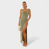 Sarella - Dlouhé šaty s odhalenými zády a mašlí" can be rewritten as:

"Sarella - Elegantní dlouhé šaty s odhalenými zády a stylovou mašlí