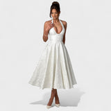 Effie - Midi šaty s texturou a výstřihem do V