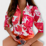 "Romina | Klasická blůza s límečkem" can be rewritten as "Romina | Elegantní blůza s límečkem".